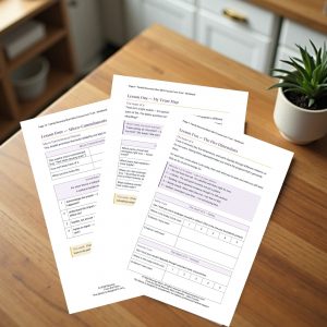 Three printed workbook pages from the Core Trust course fanned out on a wooden table beside a small potted plant